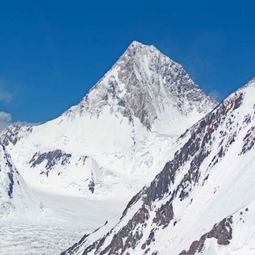 Climbers approaching the summit ridge of Gasherbrum I in the Karakoram, Pakistan