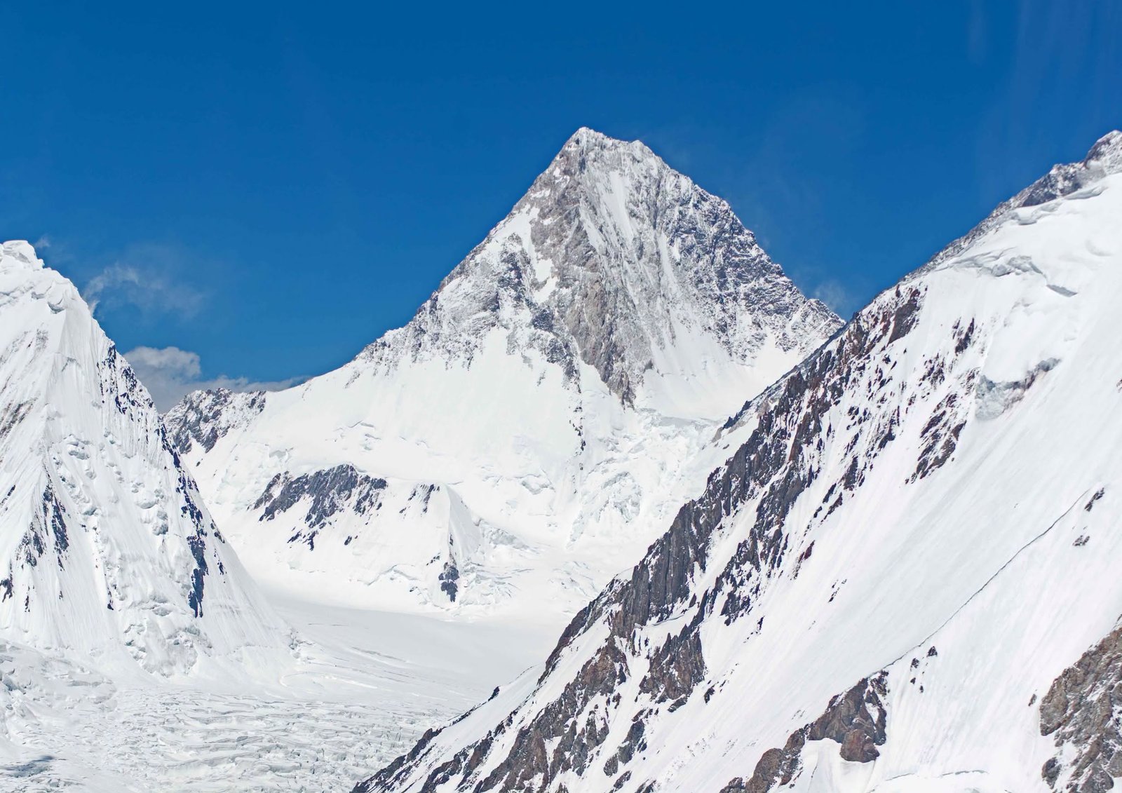 Climbers approaching the summit ridge of Gasherbrum I in the Karakoram, Pakistan