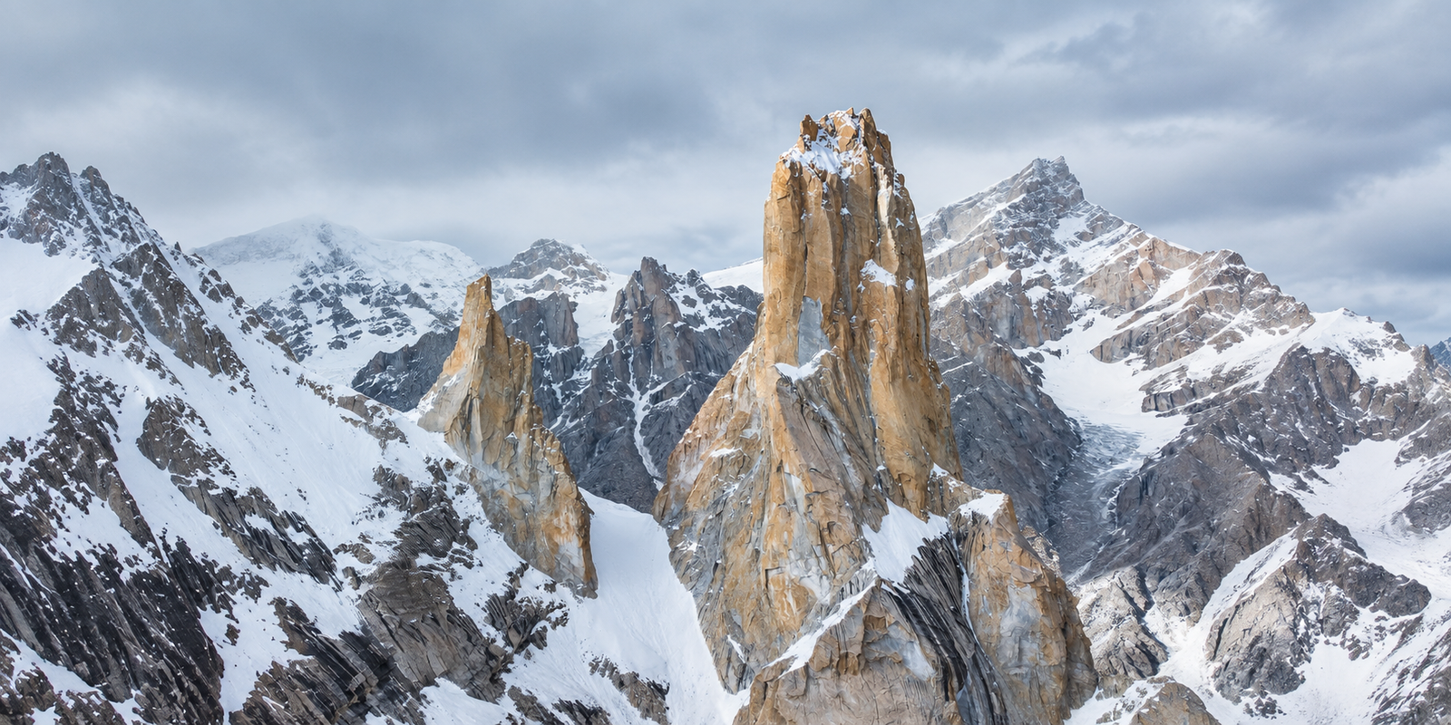 Climbers on a big-wall route on Nameless Tower with the Baltoro Glacier below, Karakoram