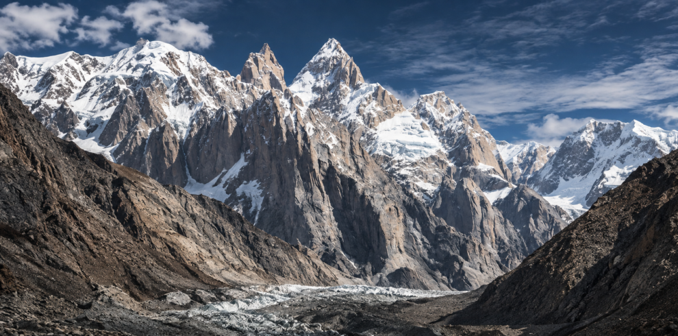 Climbers on the southwest ridge of K7 above the Charakusa Valley, Karakoram